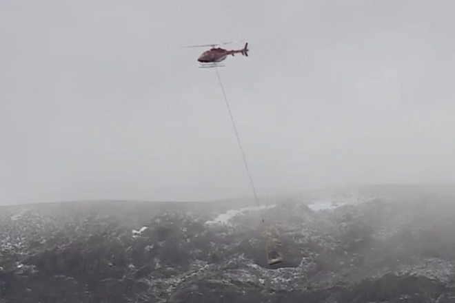 Surface Detector being flown in by Helicopter